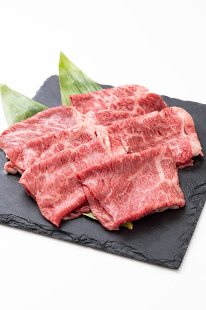 Beef shoulder loin for sukiyaki on white background.