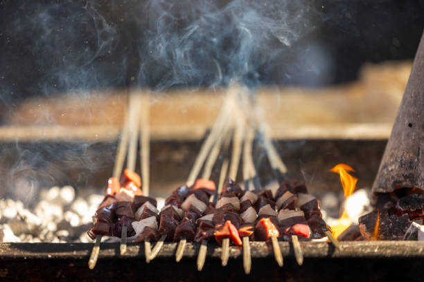 Grilled traditional Turkish liver kebab on a skewer