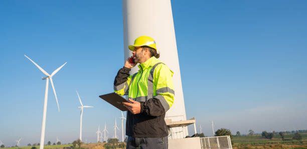 istock Engineer inspection and survey work in wind turbine farms 2194316928