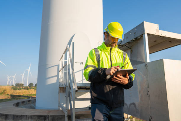 istock Engineer inspection and survey work in wind turbine farms 2194317007