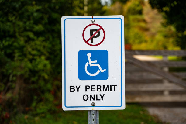 istock Handicapped or accessibility by permit only sign in the parking lot. 2194317151