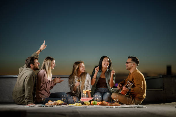 istock Guitar music during picnic night on a roof! 2194318924