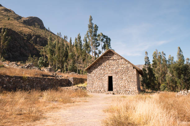 A picturesque house surrounded by lush greenery and hills in Monguí, Boyacá, Colombia. Ideal for travel and architecture enthusiasts.