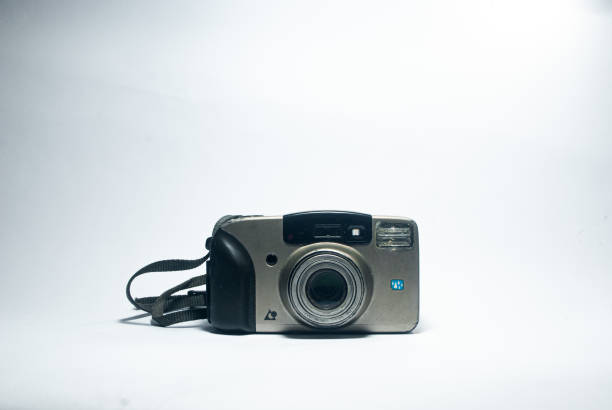 istock Vintage Film Camera with Strap on White Background 2194321846