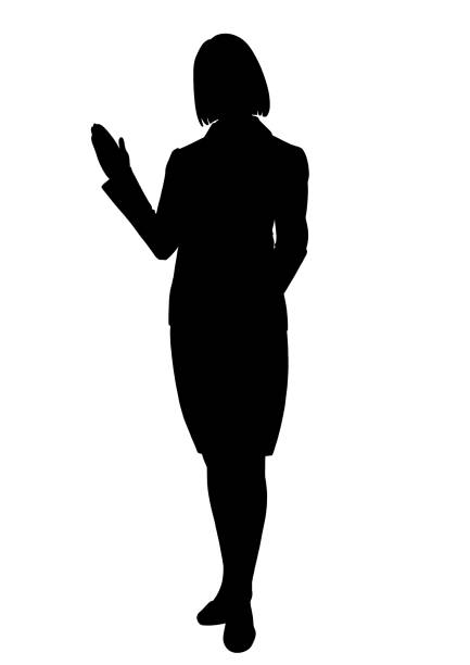 Portrait Of Smiling Young Woman Standing Over White Background