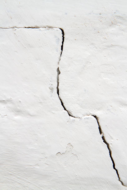 istock A close-up crack in a white wall. 2194322828