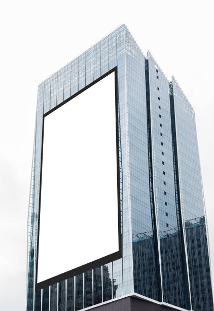 istock Mock up white vertical large LED display billboard on tower building. Clipping path for mockup 2194323325