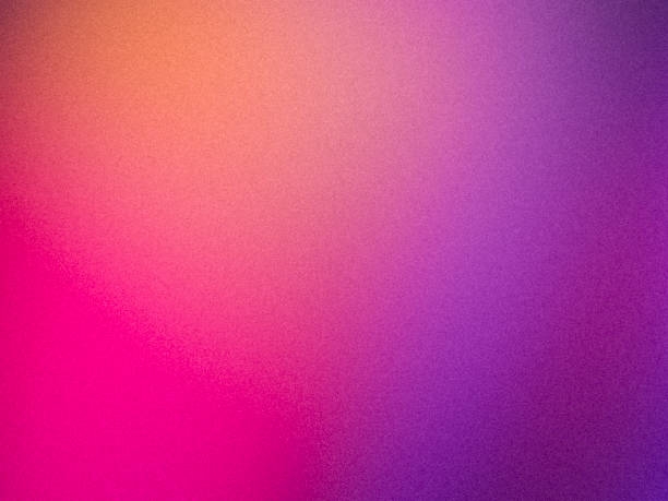 istock Colorful grainy gradient pink purple orange abstract blurry plain background 2194330110