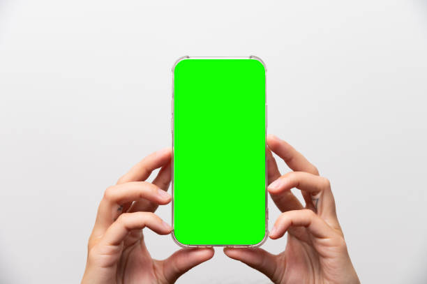 istock Hand showing smartphone with blank screen on white background. Conceptual product advertising and Conceptual marketing. High quality image for you 2194330724