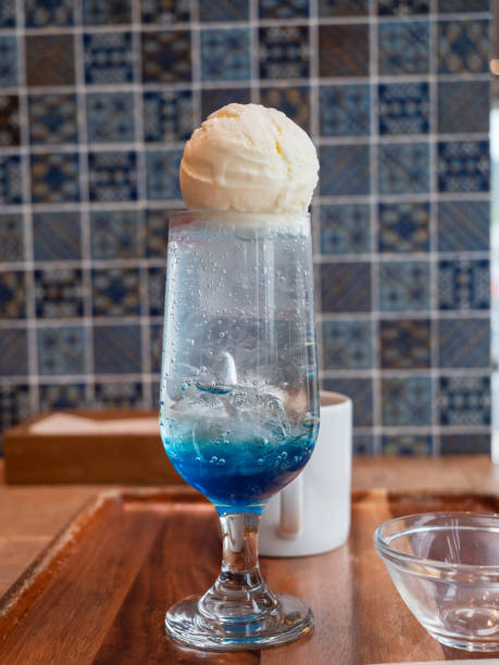 Soda with sweet blue syrup. Vanilla ice cream topping.