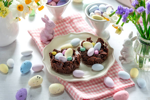 istock Easter egg nest cakes, cornflakes covered in milk chocolate topped with a miniature easter egg 2194332407