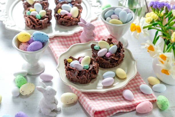 istock Easter egg nest cakes, cornflakes covered in milk chocolate topped with a miniature easter egg 2194332412