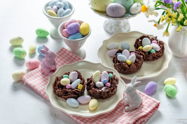 istock Easter egg nest cakes, cornflakes covered in milk chocolate topped with a miniature easter egg 2194332413