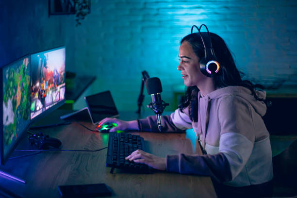 istock Woman gamer relax while play game on pc at home at night 2194334307