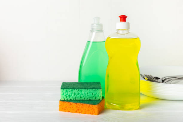 istock Colorful dish sponges on textured background. Kitchen sponge. Cleaning concept, cleaning service. Dishwashing liquid with clean and dirty dishes plate. Place for text, copy space. Wash the dishes. 2194338071