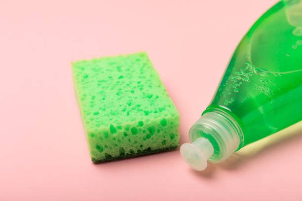 istock Colorful dish sponges on textured background. Kitchen sponge. Cleaning concept, cleaning service. Dishwashing liquid with clean and dirty dishes plate. Place for text, copy space. Wash the dishes. 2194338101