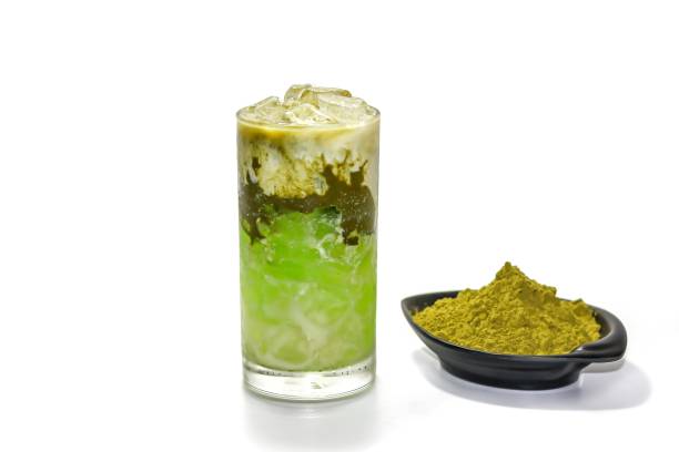 Pictures ice green tea mix with jelly cream and green tea matcha powder serving on white background and isolate concept.