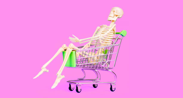 istock Skeleton in Shopping Cart as Retail Therapy Concept 2194341341