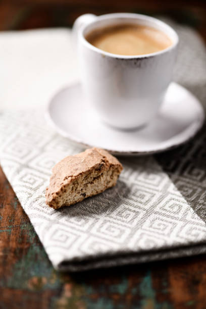 istock Cantuccini (Italian cookie) and a Cup of coffee on rustic wooden background. Close up. Copy space. 2194342114