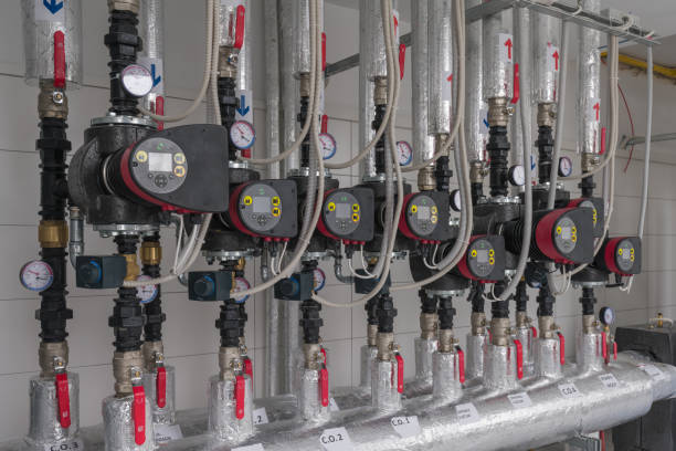 istock Close-up of a Heating System with Pipes, Pumps and Gauges 2194343985