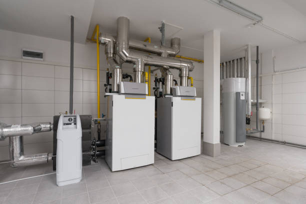 istock Mechanical Room with Heating Equipment and Pipes 2194344319