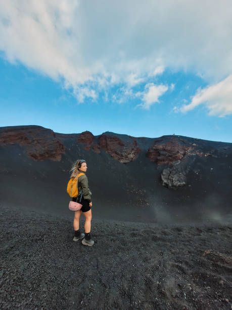 istock Young woman hiking 2194344439