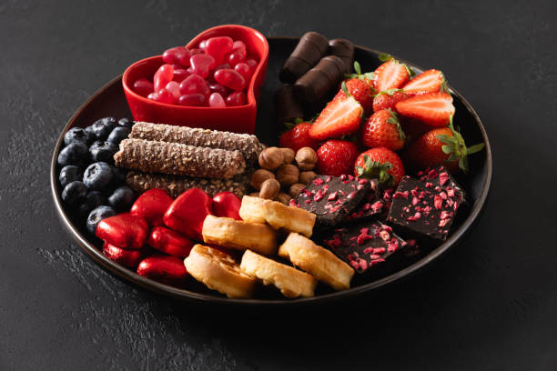 istock Charcuterie Valentines Day board with chocolate sweets. 2194346738