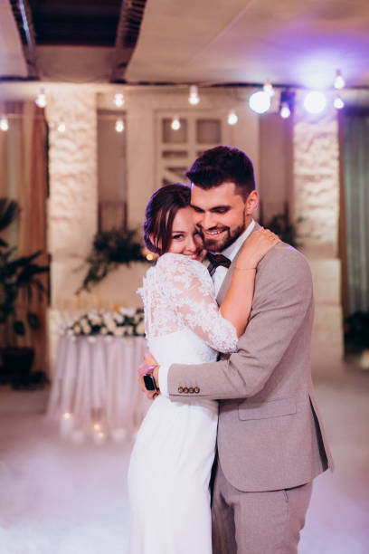 istock the first dance of the bride and groom inside a restaurant 2194347093