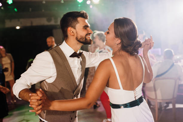 istock the first dance of the bride and groom inside a restaurant 2194347143