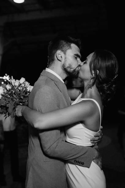 istock newlyweds at a wedding of sparklers 2194348020