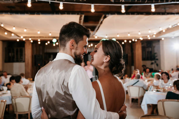 istock the first dance of the bride and groom inside a restaurant 2194348493