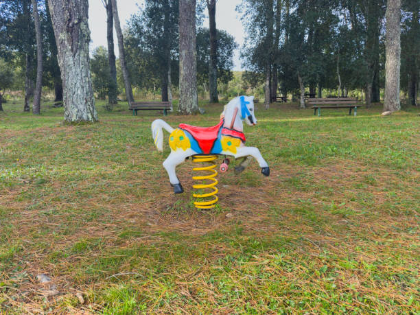 istock Colorful horse spring rider in a public park 2194348915