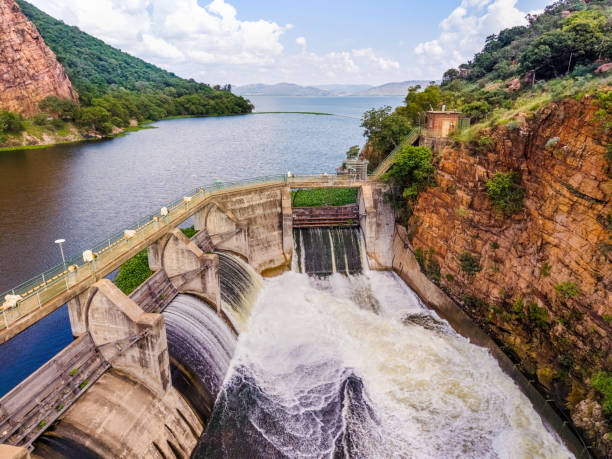 istock Hartbeespoort Dam Wall with Sluice Gates Open 2194348946