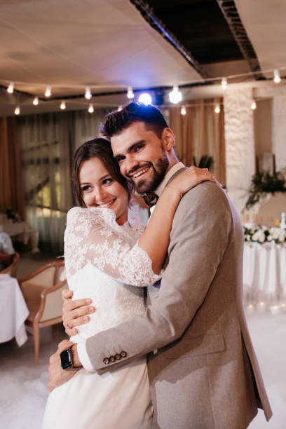 istock the first dance of the bride and groom inside a restaurant 2194348959