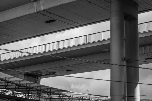 istock Urban overpass architecture showcases concrete structures under a cloudy sky 2194348961