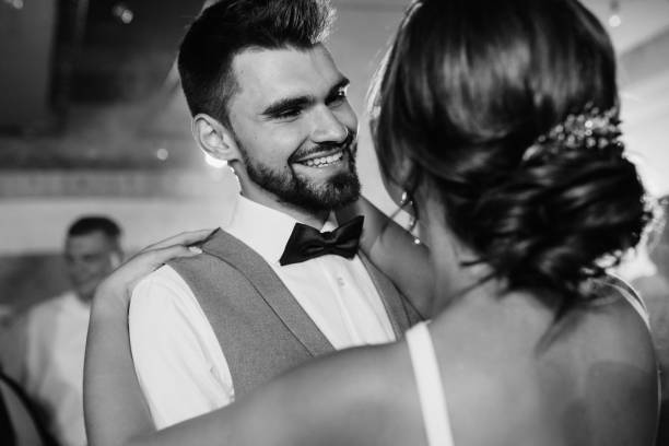 istock the first dance of the bride and groom inside a restaurant 2194349005