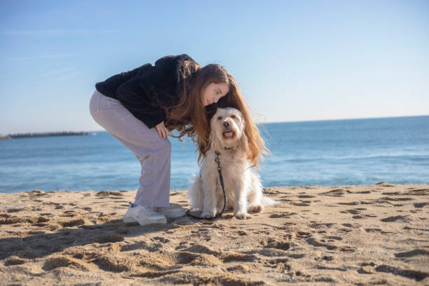 istock Young woman with cerebral palsy walking her dog 2194350040