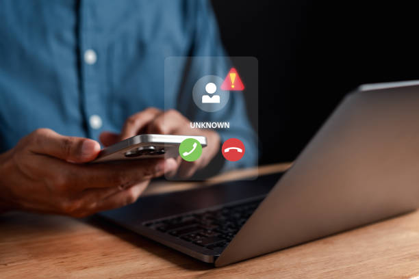 istock Unknown number calling concept. Scam phone call from stranger. Man answering to incoming call. Call center gang, scammer or stranger. Hoax person with fake identity. 2194350093