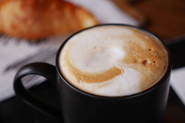 istock late coffee on cafe table at cafe background 2194352230