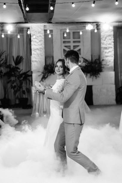 istock the first dance of the bride and groom inside a restaurant 2194352268