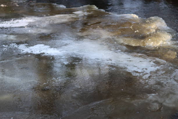 istock Close up of a frozen river surface 2194357112