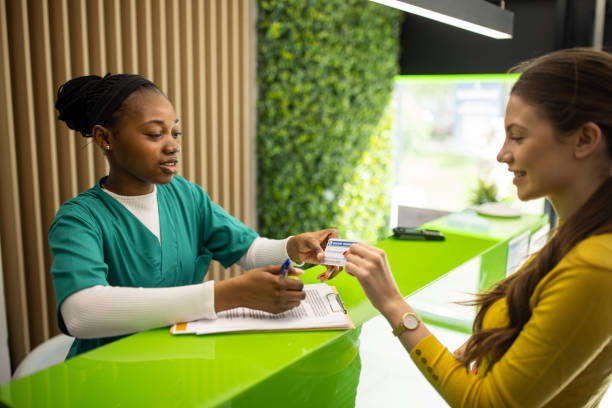 Medical worker talking with patient at the clinic