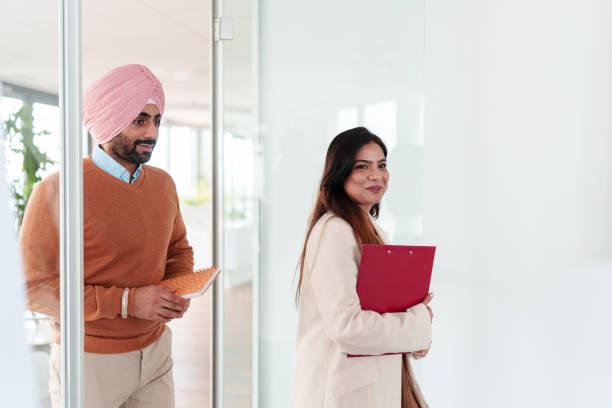 istock Confident Indian Business Executives in Modern Office Setting 2194364457
