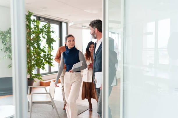 istock Diverse Business Executives in Collaborative Meeting Setting 2194364464