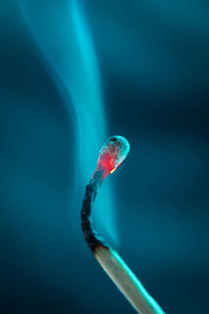 Close-Up Of Lit Match