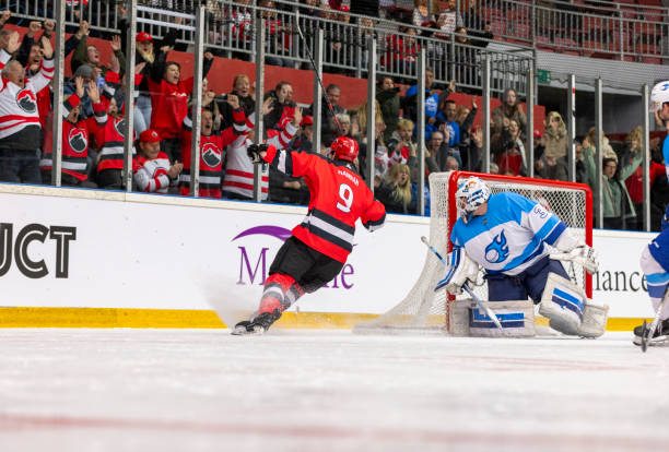 istock Ice Hockey Goal Celebration with Cheering Fans 2194365622