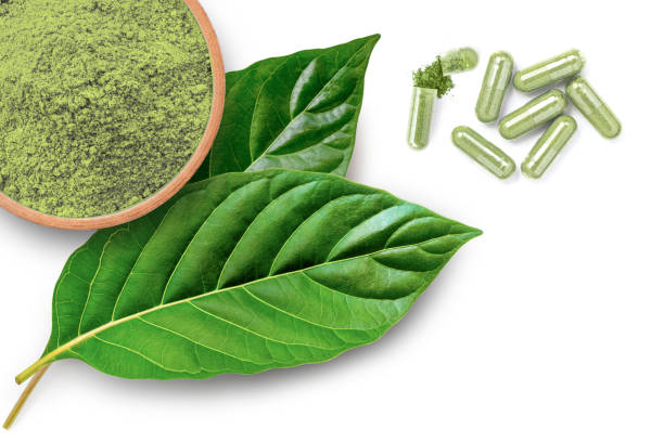 istock Green medicine capsule pill with Kratom leaf 2194366633