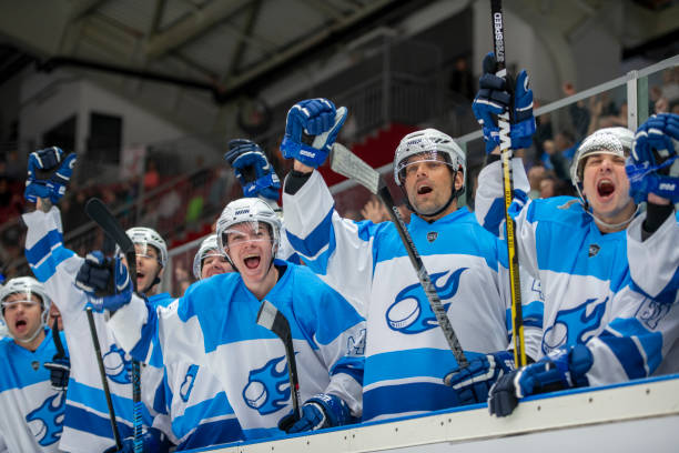 istock Ecstatic Ice Hockey Team Celebrating a Victory Moment 2194367368