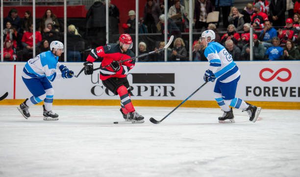 istock Intense Ice Hockey Game in Action 2194367518