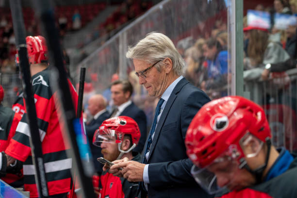 istock Professional Ice Hockey Match: Coach Using Smartphone 2194368036